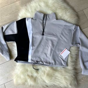 Sports Illustrated 3/4 Zip Up. Athletic Top